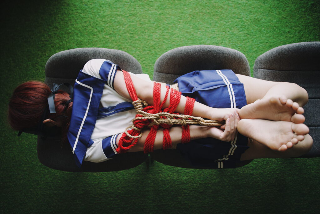 Kitty hogtied in japanese schoolgirl uniform